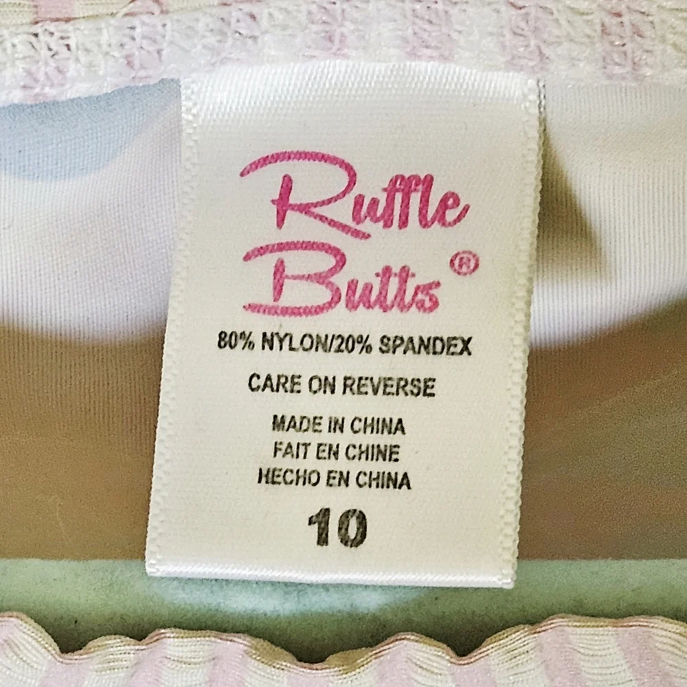 NWOT RuffleButts Girls' Sz 10 Long Sleeve Rash Guard Swim Top in Pastel Petals